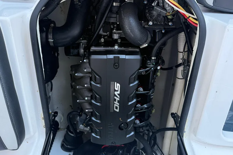 Slide: The Image of Engine compartment of 2023 Yamaha Boats 195S with SVHO engine. - 24