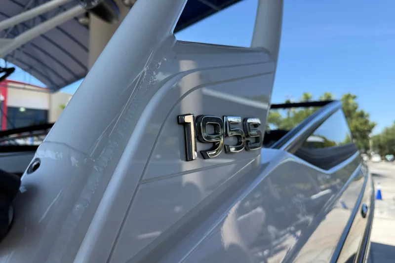 Slide: The Image of Close-up of 2023 Yamaha Boats 195S model emblem on sleek exterior. - 7