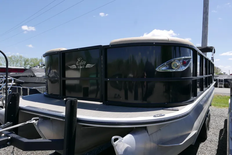 The Image of 2019 Bentley 253 Admiral RE pontoon boat with sleek black exterior and modern design. - 0