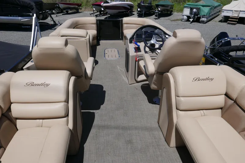 Slide: The Image of Luxurious interior of a 2019 Bentley 253 Admiral RE boat with beige seating. - 10