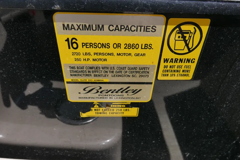 Slide: The Image of Maximum capacity warning label on 2019 Bentley 253 Admiral RE boat, 16 persons or 2860 lbs. - 11