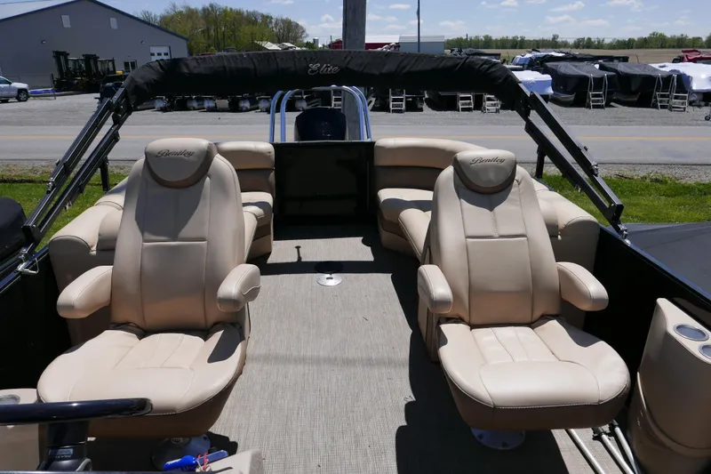 Slide: The Image of 2019 Bentley 253 Admiral RE boat interior with beige leather seats and open deck. - 7