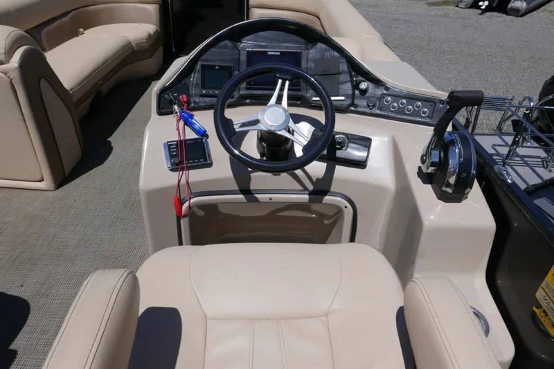 Slide: The Image of 2019 Bentley 253 Admiral RE boat interior with steering wheel and control panel. - 9
