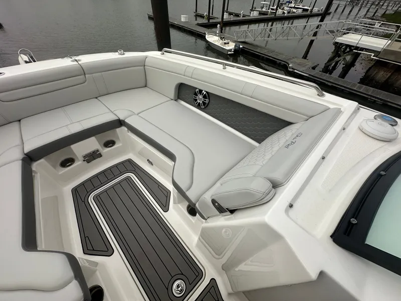 Slide: The Image of Interior of 2024 Sea Ray SDX 290 Outboard with gray upholstery. - 7