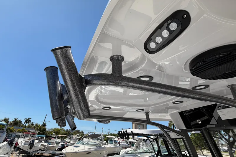Slide: The Image of 2026 Sea Pro 262 DLX with rod holders and LED lights. - 14