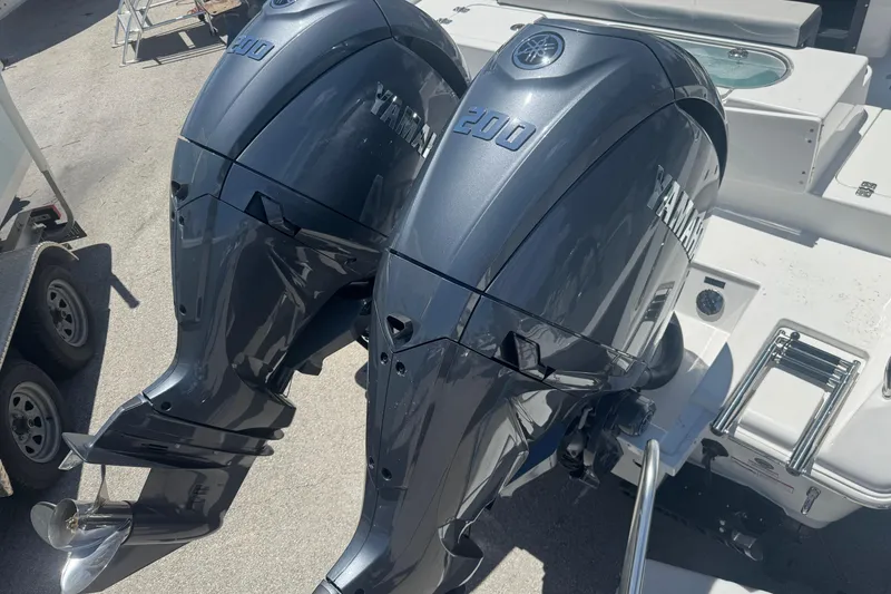 Slide: The Image of Two Yamaha 200 outboard motors on a 2026 Sea Pro 262 DLX boat. - 15