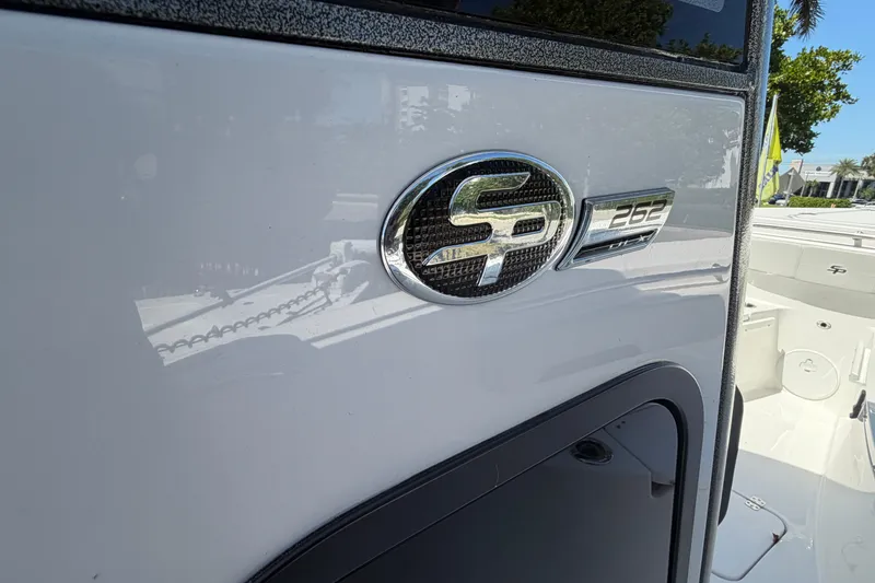 Slide: The Image of Close-up of Sea Pro 262 DLX boat emblem, year 2026. - 17