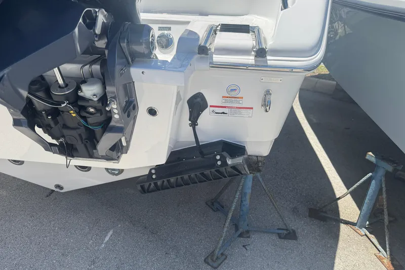 Slide: The Image of Rear view of a 2026 Sea Pro 262 DLX boat motor. - 18