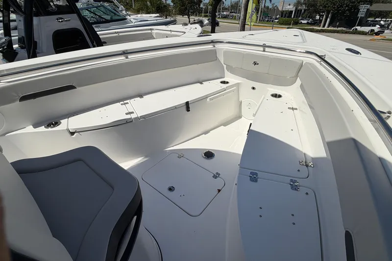 Slide: The Image of Interior of 2026 Sea Pro 262 DLX boat, white upholstery. - 29