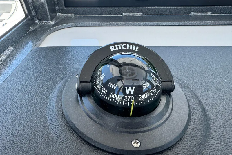 Slide: The Image of Ritchie compass on Sea Pro 262 DLX boat, year 2026. - 41