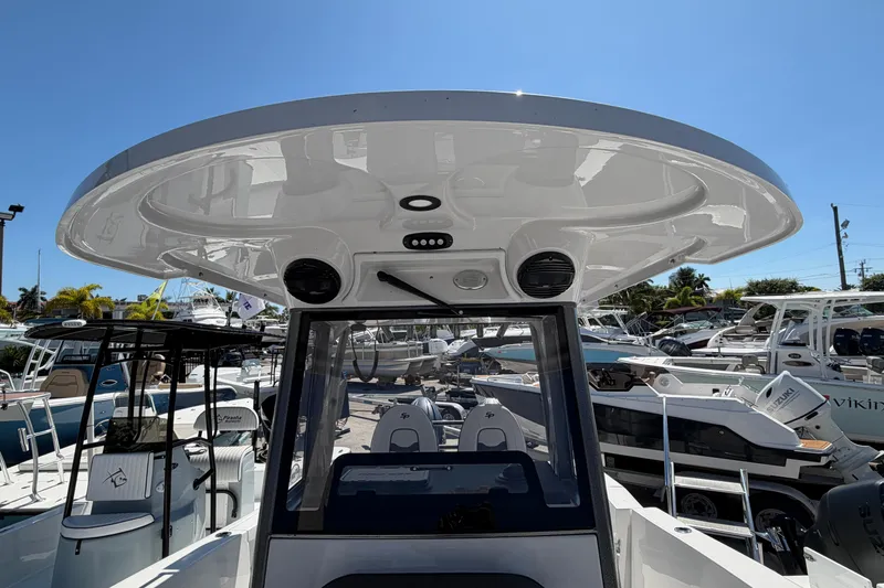 Slide: The Image of 2026 Sea Pro 262 DLX boat with modern helm station. - 6