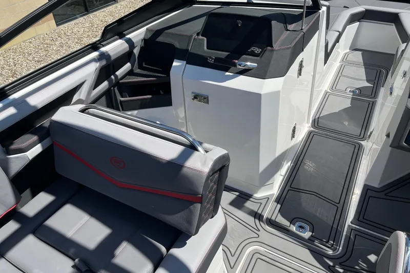 Slide: The Image of 2023 Cobalt R8 Surf boat interior with sleek seating and modern design. - 11