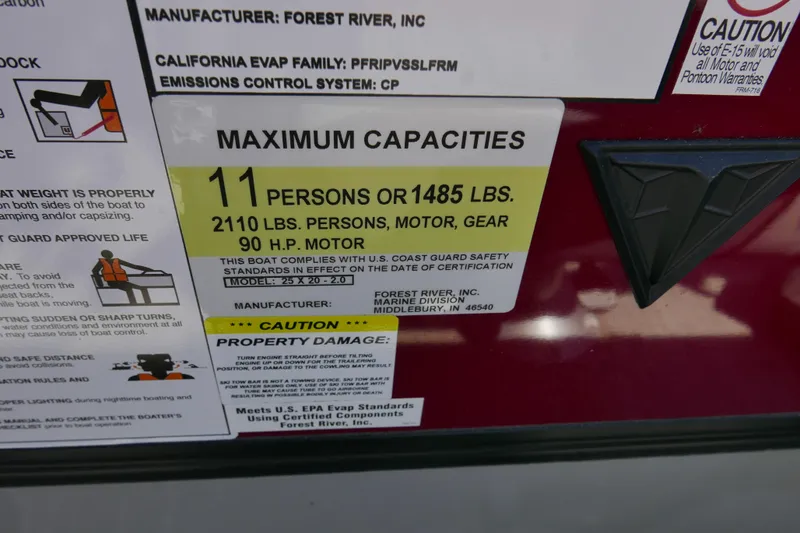 Slide: The Image of Maximum capacity label on 2023 Trifecta C Series boat, indicating weight and passenger limits. - 13