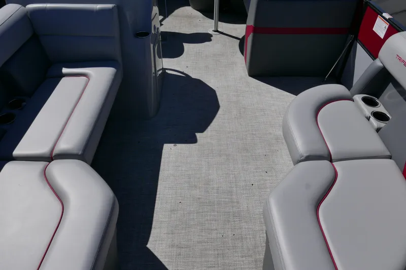 Slide: The Image of Interior of 2023 Trifecta C Series boat with gray seating and cup holders. - 5