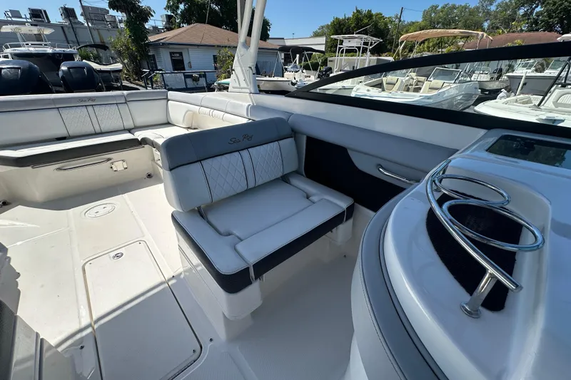 Slide: The Image of 2017 Sea Ray SDX 290 Outboard boat interior with luxurious seating and sleek design. - 13