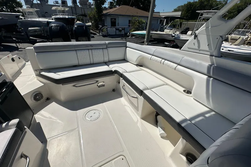 Slide: The Image of Spacious seating area on a 2017 Sea Ray SDX 290 Outboard boat, featuring sleek design. - 20