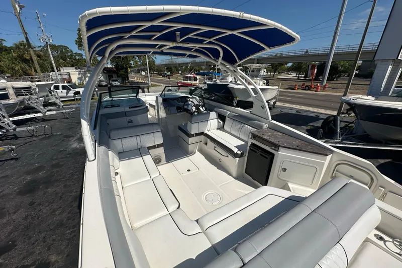 Slide: The Image of 2017 Sea Ray SDX 290 Outboard boat with spacious seating and canopy. - 24