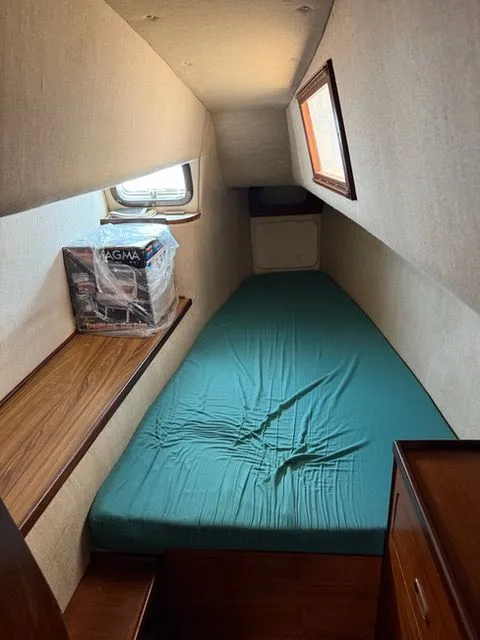 Slide: The Image of Interior of a 1983 Prout 37 Snow Goose yacht with sleeping area. - 18