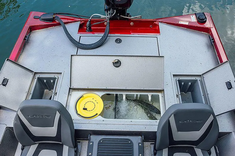 Slide: The Image of Manufacturer Provided Image: 2025 Lowe Stinger 175C boat interior with storage compartments and livewell. - 6