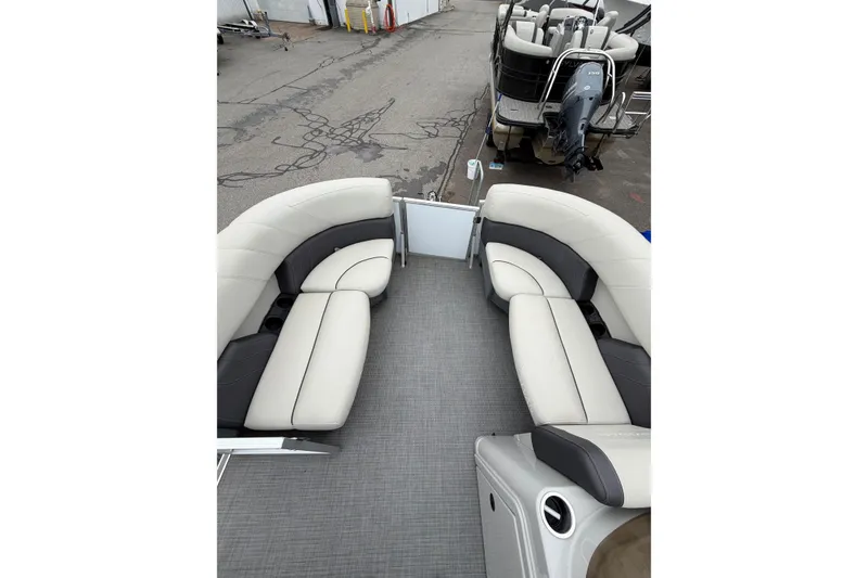 Slide: The Image of 2023 Sylvan Mirage 820 LZ pontoon boat with spacious seating and modern design. - 11