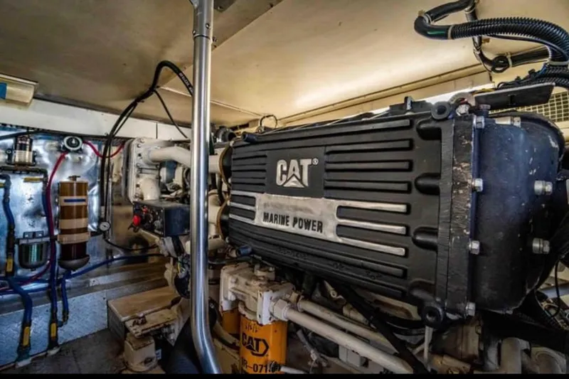 Slide: The Image of Engine room of 1999 Ocean Yachts 56 Super Sport with CAT Marine Power engine. - 10
