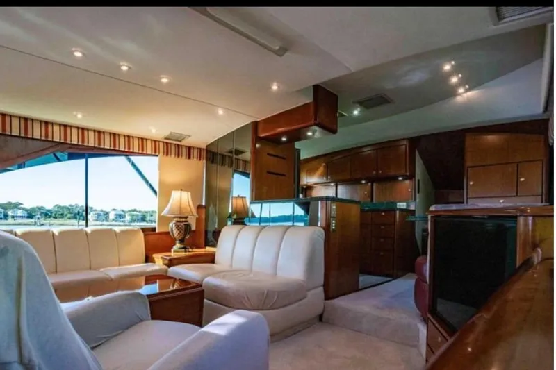 Slide: The Image of Luxurious interior of a 1999 Ocean Yachts 56 Super Sport with elegant furnishings. - 4