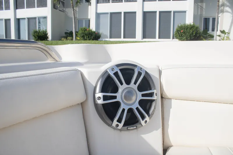 Slide: The Image of Speaker on 2020 Grady-White Freedom 285 boat, with white seating and modern design. - 6