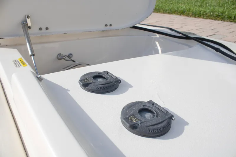 Slide: The Image of Open storage compartment on 2020 Grady-White Freedom 285 boat deck. - 7