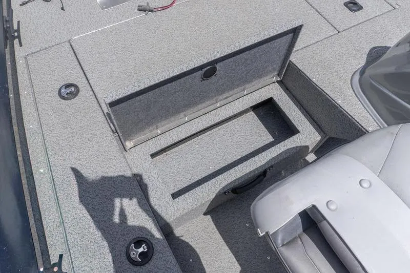 Slide: The Image of 2019 G3 Sportsman 1710 boat interior with open storage compartment. - 11