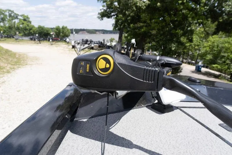 Slide: The Image of 2019 G3 Sportsman 1710 boat control panel with scenic lake view. - 14