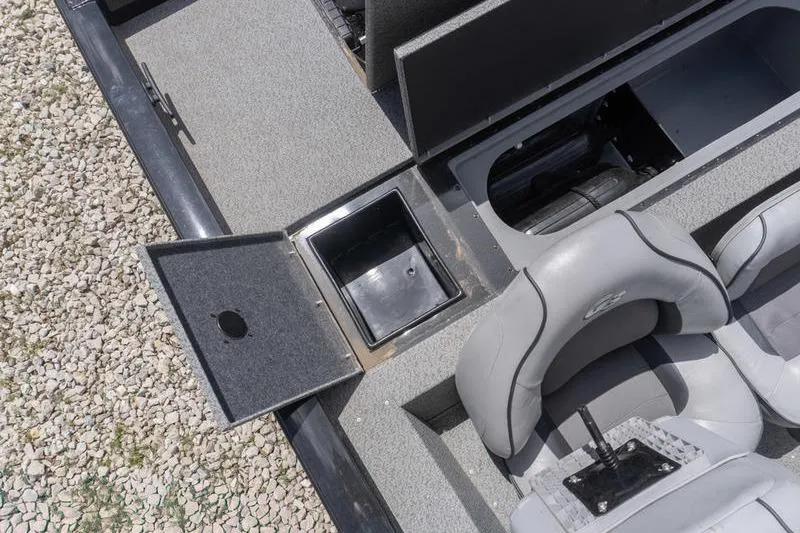 Slide: The Image of 2019 G3 Sportsman 1710 boat interior with storage compartments and seating. - 18