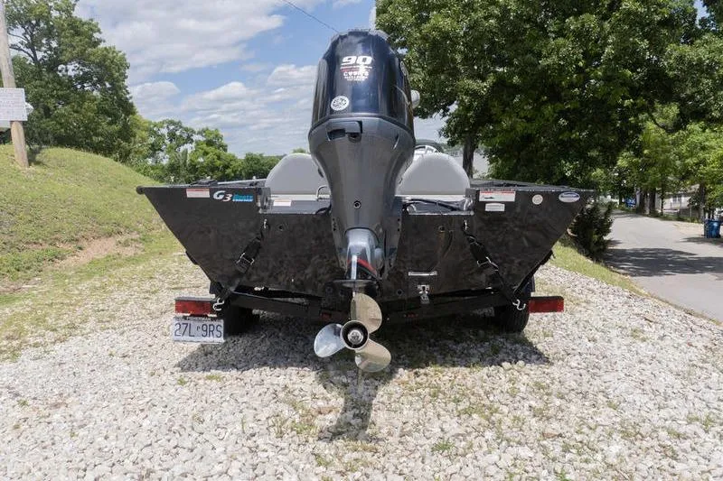 Slide: The Image of 2019 G3 Sportsman 1710 boat with 90 HP engine on gravel. - 3
