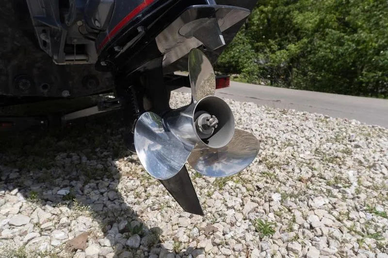 Slide: The Image of 2019 G3 Sportsman 1710 boat propeller on gravel surface. - 5