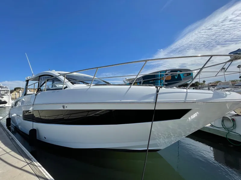 The Image of 2020 Cruisers Yachts 390 Express Coupe docked on a sunny day. - 0