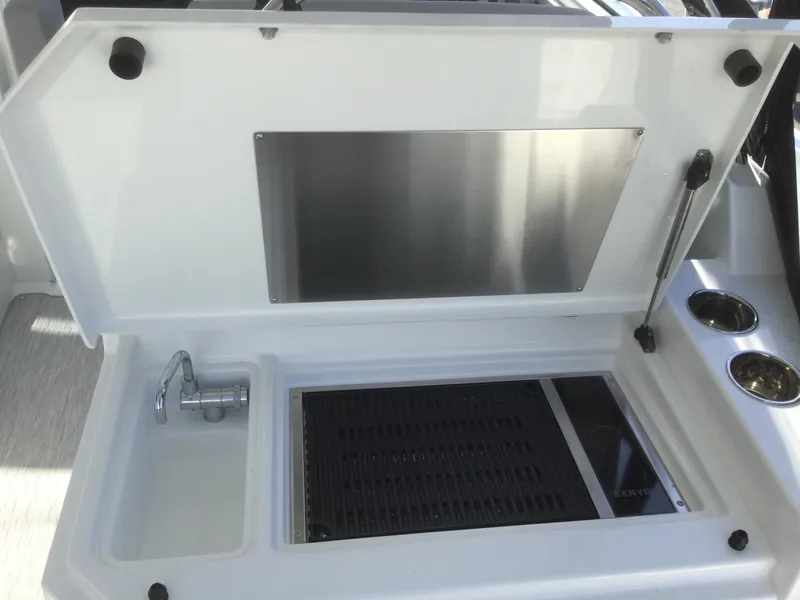 Slide: The Image of Kitchen area of the 2020 Cruisers Yachts 390 Express Coupe. - 20