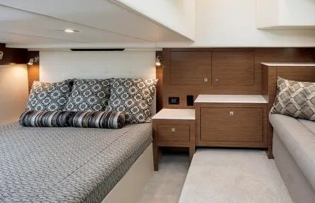 Slide: The Image of Interior of 2020 Cruisers Yachts 390 Express Coupe, luxurious bedroom design. - 26