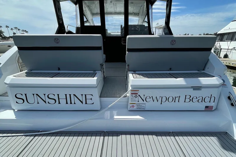 Slide: The Image of Rear view of 2020 Cruisers Yachts 390 Express Coupe in Newport Beach. - 6
