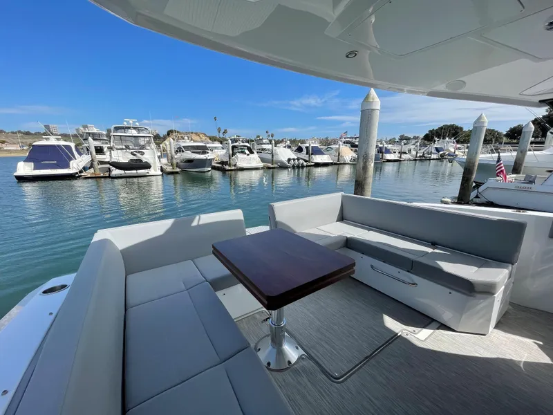 Slide: The Image of Interior of 2020 Cruisers Yachts 390 Express Coupe at marina. - 9