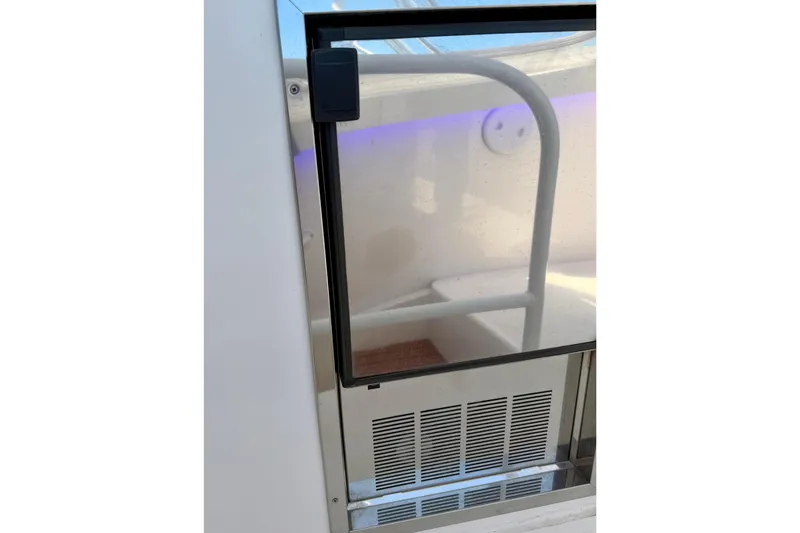 Slide: The Image of Glass door on 2008 Luhrs 35 Convertible yacht, showcasing interior details. - 17