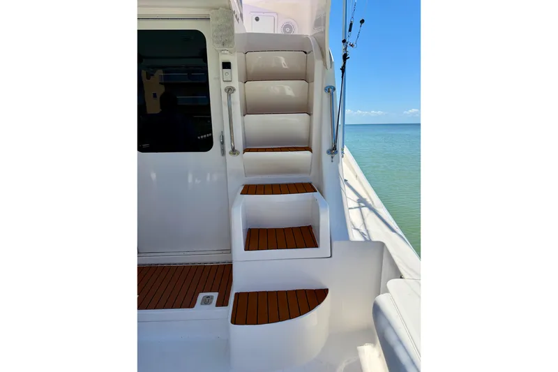 Slide: The Image of Staircase on 2008 Luhrs 35 Convertible yacht with ocean view. - 19