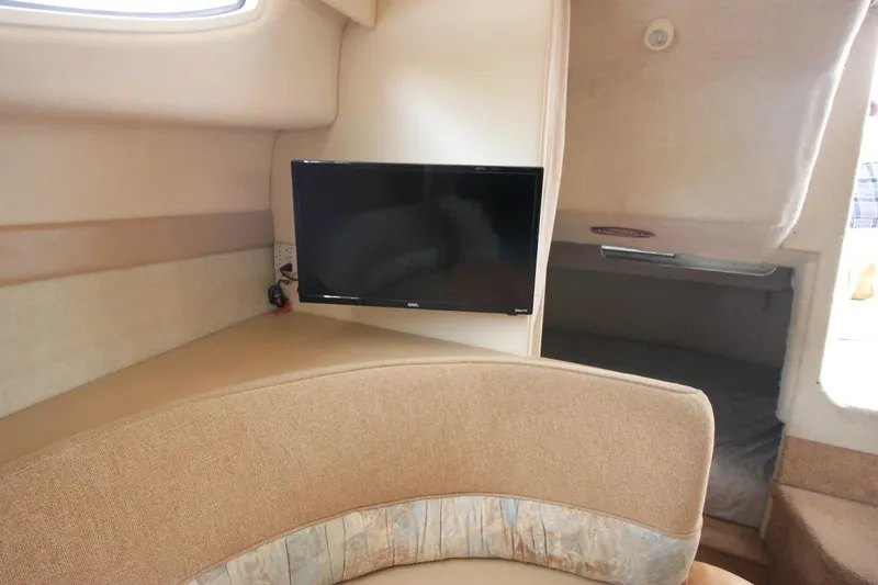 Slide: The Image of Interior of 2001 Bayliner 3055 Ciera with TV and cozy seating area. - 18
