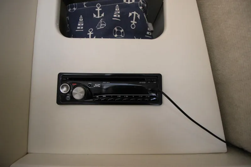 Slide: The Image of JVC stereo system in 2001 Bayliner 3055 Ciera boat interior. - 23