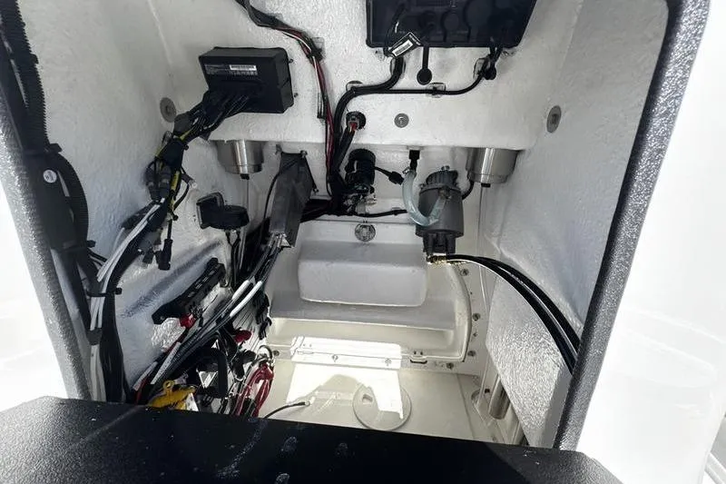 Slide: The Image of Interior view of 2026 Blazer Bay 2200 boat's wiring and components. - 13