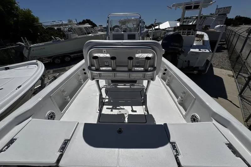 Slide: The Image of 2026 Blazer Bay 2200 boat interior with seating and storage compartments. - 23