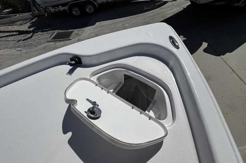 Slide: The Image of Open storage compartment on 2026 Blazer Bay 2200 boat deck, showcasing sleek design. - 8