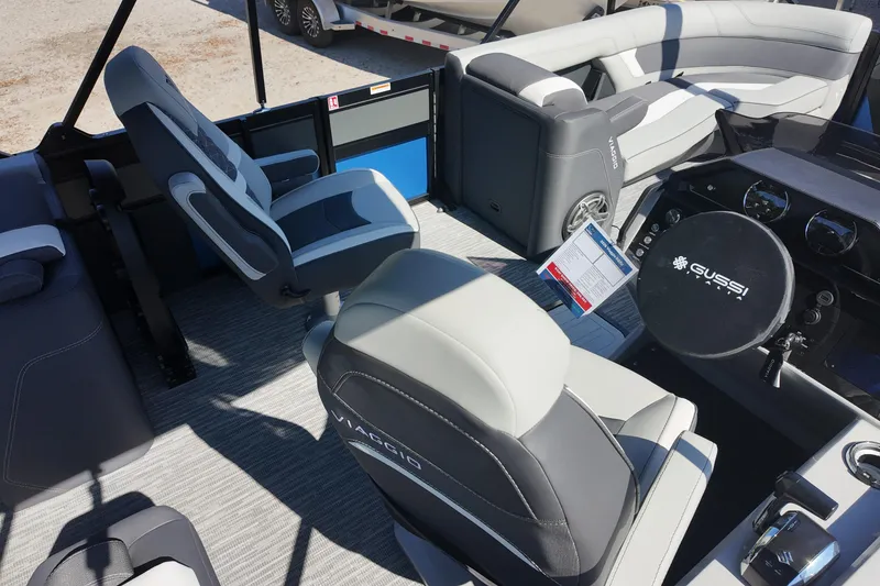 Slide: The Image of Interior of 2026 Viaggio Diamante U 22 boat with modern seating and steering wheel. - 3