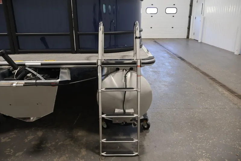 Slide: The Image of 2026 Bentley Pontoons 200 LE CW with ladder in a garage setting. - 25