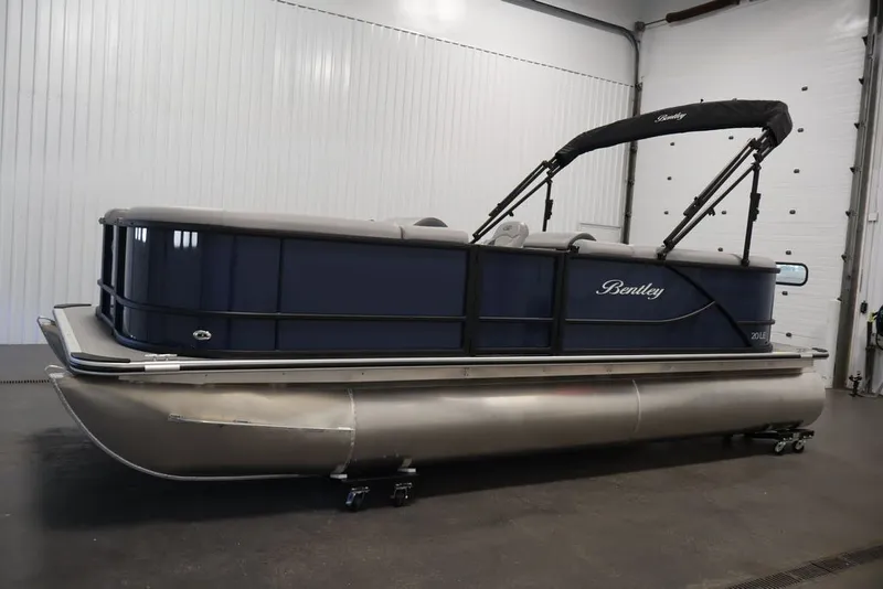 Slide: The Image of 2026 Bentley Pontoons 200 LE CW in a showroom, featuring sleek design and modern amenities. - 14