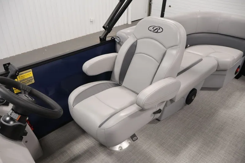 Slide: The Image of 2026 Bentley Pontoons 200 LE CW interior with luxurious gray seating and steering wheel. - 34