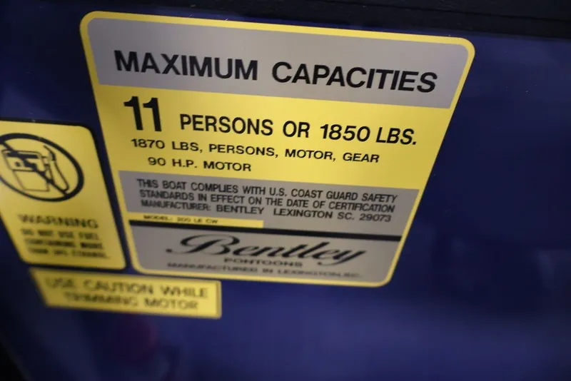 Slide: The Image of 2026 Bentley Pontoons 200 LE CW capacity label: 11 persons, 1850 lbs, 90 HP motor. - 29